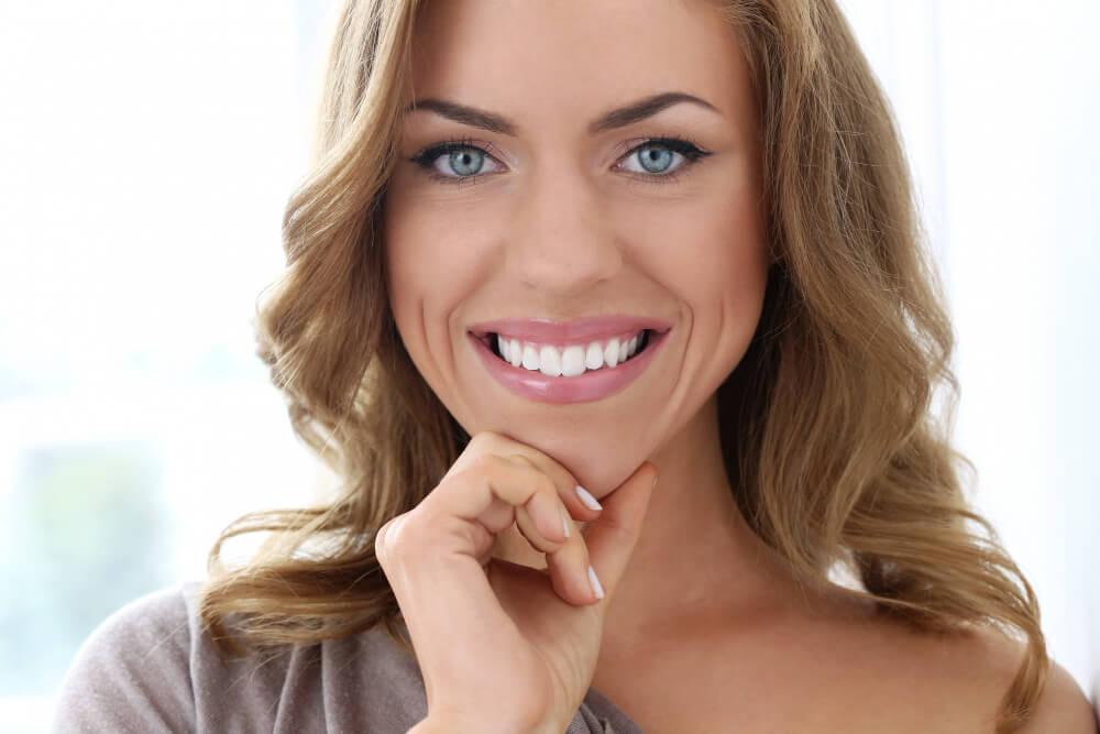 beautiful woman smiling with brilliant set of teeth